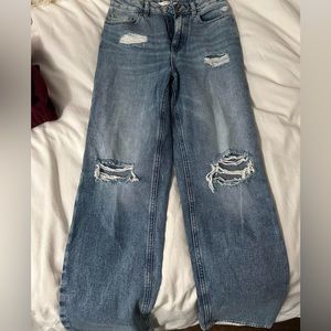 PacSun’s blue ripped wide leg jeans